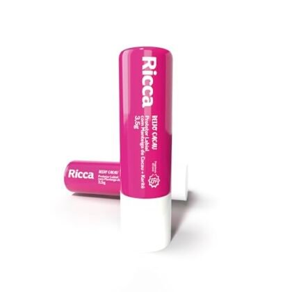 Aqui estão algumas opções de texto ALT para a imagem, usando "Ricca Labial", com diferentes focos: **Opção 1 (Simples e direta):** `Ricca Labial: Protetor labial com manteiga de cacau e karité, FPS 15.` **Opção 2 (Um pouco mais descritiva):** `Ricca Labial: Imagem do protetor labial Ricca com manteiga de cacau e karité, oferecendo proteção solar FPS 15.` **Opção 3 (Foco na marca e benefício):** `Ricca Labial: Hidratação e proteção solar para seus lábios com o protetor labial Ricca, fórmula com manteiga de cacau, karité e FPS 15.` **Opção 4 (Para e-commerce, com foco na busca):** `Ricca Labial: Compre protetor labial Ricca com manteiga de cacau, karité e FPS 15 online.` **Qual escolher?** * Se você precisa de algo **rápido e direto**, a Opção 1 é a melhor. * Se você quer dar um pouco mais de **contexto**, a Opção 2 funciona bem. * Se o foco é **destacar os benefícios**, a Opção 3 é ideal. * Se você está usando a imagem em um **e-commerce**, a Opção 4 pode ser a melhor para SEO. Lembre-se que o texto ALT deve ser breve, descritivo e relevante para o conteúdo da página.