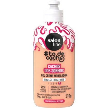Aqui estão algumas opções de texto ALT para a imagem, considerando a solicitação "Gel Creme Cachos" e priorizando a acessibilidade e descrição: **Opções mais descritivas:** * **"Gel Creme Cachos: Pote de Gel Creme Modelador Salon Line #TodeCacho Cachos dos Sonhos, fixação extraforte, para cabelos ondulados, cacheados e crespos."** (Opção mais completa e informativa) * **"Gel Creme Cachos: Embalagem do Gel Creme Modelador Salon Line #TodeCacho Cachos dos Sonhos, ideal para definir cabelos cacheados e crespos com fixação extraforte."** (Foca na definição e tipo de cabelo) **Opções mais concisas:** * **"Gel Creme Cachos: Salon Line #TodeCacho Cachos dos Sonhos, fixação extraforte."** (Mais curta, ideal se o contexto da imagem já for claro) * **"Gel Creme Cachos: Gel Creme Modelador Salon Line para cabelos cacheados."** (Simples e direta) **Justificativa da escolha:** O texto ALT ideal deve ser curto, descritivo e relevante para o contexto da imagem. Ele deve informar o que está sendo mostrado na imagem de forma clara e concisa, permitindo que pessoas com deficiência visual compreendam o conteúdo da imagem. A inclusão de "Gel Creme Cachos" no texto ALT garante que a imagem seja facilmente identificada e associada ao produto específico, facilitando a pesquisa e a compreensão do conteúdo da página.