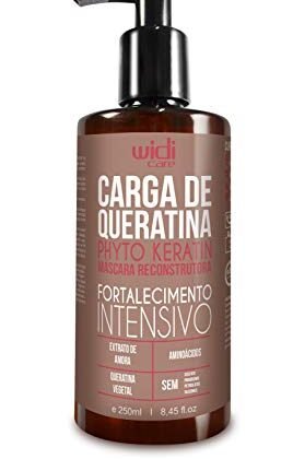 Aqui estão algumas opções de texto ALT para a imagem, usando a frase "Queratina Widi Care", com diferentes níveis de detalhe: **Opção 1 (Mais básica):** `Queratina Widi Care` **Opção 2 (Um pouco mais descritiva):** `Queratina Widi Care para reconstrução capilar` **Opção 3 (Com mais informações do título):** `Queratina Widi Care Carga De Queratina Phyto Keratin - Médio` **Opção 4 (Focando no benefício):** `Queratina Widi Care para cabelos fortes e saudáveis` **Qual escolher?** A melhor opção depende do contexto da imagem e do quão detalhado você precisa ser. * Se o foco é apenas identificar a marca, a **Opção 1** é suficiente. * Se você quer dar uma ideia do uso, a **Opção 2** é melhor. * Se o contexto exige identificação precisa do produto, a **Opção 3** é a mais adequada. * Se você quer focar no benefício, a **Opção 4** é uma boa escolha. Eu recomendaria a **Opção 3** pois ela inclui todas as informações do título do produto, tornando a descrição da imagem mais completa e precisa.