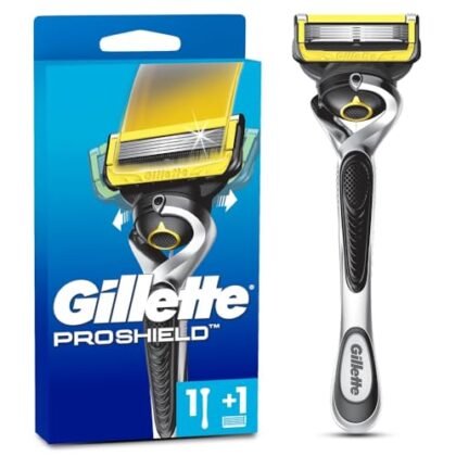 Aqui estão algumas opções de texto ALT, variando em nível de detalhe e foco: * **Opção 1 (Curta e direta):** Barbear Proshield * **Opção 2 (Um pouco mais descritiva):** Aparelho de Barbear Gillette Fusion Proshield. Barbear Proshield. * **Opção 3 (Foco na proteção):** Barbear Proshield: Proteção e suavidade para um barbear perfeito. * **Opção 4 (Considerando o contexto da imagem):** Aparelho de barbear Gillette Fusion Proshield com tecnologia Barbear Proshield para um barbear rente e confortável. A escolha do melhor texto ALT depende do contexto da imagem e do objetivo da página. Se a imagem já estiver cercada de texto descritivo, a opção mais curta pode ser suficiente. Se a imagem for a principal forma de comunicar o produto, a opção mais descritiva pode ser melhor.