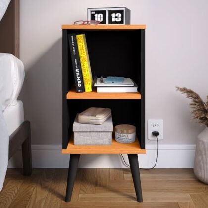 Aqui estão algumas opções de texto ALT para a imagem, usando "Mesa Cabeceira Retrô", com diferentes níveis de detalhe: **Opção 1 (Curta e direta):** ``` Mesa Cabeceira Retrô preta e cinamomo. ``` **Opção 2 (Adicionando detalhes visuais):** ``` Mesa Cabeceira Retrô com prateleira, em preto e cinamomo, estilo compacto. ``` **Opção 3 (Focando no estilo e função):** ``` Mesa Cabeceira Retrô charmosa, preta e cinamomo, ideal para otimizar espaço ao lado da cama. ``` **Opção 4 (Mais descritiva):** ``` Imagem de uma Mesa Cabeceira Retrô compacta, com acabamento em preto e cinamomo, destacando sua prateleira para organização. ``` **Recomendação:** Eu recomendo usar a **Opção 2** ou **Opção 3**. Elas fornecem uma boa descrição da imagem, incluindo os principais elementos visuais e o estilo retrô, além de mencionar a função e as cores. Lembre-se que o texto ALT deve ser conciso e descrever o conteúdo da imagem da forma mais precisa possível para usuários com deficiência visual e para mecanismos de busca.