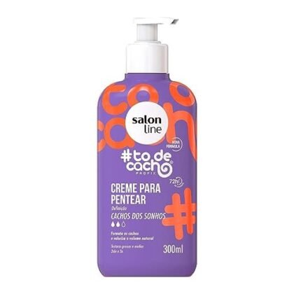 **Opções de texto ALT:** * **Opção 1 (Descritiva):** Salon Line #TodeCacho Creme de Pentear Cachos dos Sonhos, ideal para Cachos Definidos. * **Opção 2 (Focada no benefício):** Creme para Cachos Definidos: Salon Line #TodeCacho Cachos dos Sonhos. * **Opção 3 (Inclusiva):** Produto Vegano para Cachos Definidos: Salon Line #TodeCacho Cachos dos Sonhos. A escolha ideal depende do contexto da imagem e do que você quer destacar. Se a imagem mostra o resultado do produto, foque no "Cachos Definidos". Se a imagem mostra a embalagem, inclua o nome do produto.