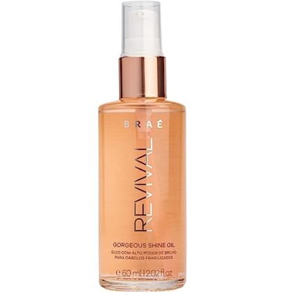 Aqui estão algumas opções de texto ALT para a imagem do "Gorgeous Shine Oil Revival 60ml Reparador, BRAÉ", usando "Óleo Capilar BRAÉ", variando em detalhes e foco: **Opção 1 (Simples e direta):** `Óleo Capilar BRAÉ Gorgeous Shine Oil Revival 60ml.` **Opção 2 (Com foco no benefício):** `Óleo Capilar BRAÉ: Gorgeous Shine Oil Revival, para cabelos reparados e com brilho.` **Opção 3 (Mais descritiva):** `Frasco de 60ml do Óleo Capilar BRAÉ Gorgeous Shine Oil Revival, um reparador para cabelos danificados.` **Opção 4 (Se a embalagem estiver visível):** `Embalagem do Óleo Capilar BRAÉ Gorgeous Shine Oil Revival, com design elegante e moderno.` **Opção 5 (Se estiver sendo usado):** `Cabelos com brilho após aplicação do Óleo Capilar BRAÉ Gorgeous Shine Oil Revival.` **Qual escolher?** A melhor opção depende do contexto da imagem: * Se a imagem é apenas do produto em si, a opção 1 ou 3 são boas. * Se a imagem mostra o produto sendo usado e o resultado, a opção 5 é mais adequada. * Se você quer enfatizar o benefício, a opção 2 é uma boa escolha. * Se você quer focar na embalagem, a opção 4 é a mais indicada. Lembre-se que o texto ALT deve ser conciso e relevante ao conteúdo da imagem, auxiliando usuários com deficiência visual e mecanismos de busca a entender o que a imagem representa.