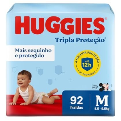 Aqui estão algumas opções de texto ALT para a imagem, utilizando "Fralda Huggies M", cada uma com um foco diferente: * **Opção 1 (Descritiva):** "Fralda Huggies M, embalagem de 92 unidades da linha Tripla Proteção." * **Opção 2 (Simples e direta):** "Fralda Huggies M." * **Opção 3 (Foco na marca):** "Fralda Huggies M, garantia de proteção e conforto para o seu bebê." * **Opção 4 (Destacando o tamanho):** "Fralda Huggies M, ideal para bebês de [peso/idade]." (Se tiver essa informação na imagem, adicione!) A melhor opção dependerá do contexto da imagem e do que você deseja enfatizar. Se a imagem mostra a embalagem completa, a opção 1 é a mais completa. Se é apenas a fralda em si, a opção 2 pode ser suficiente.